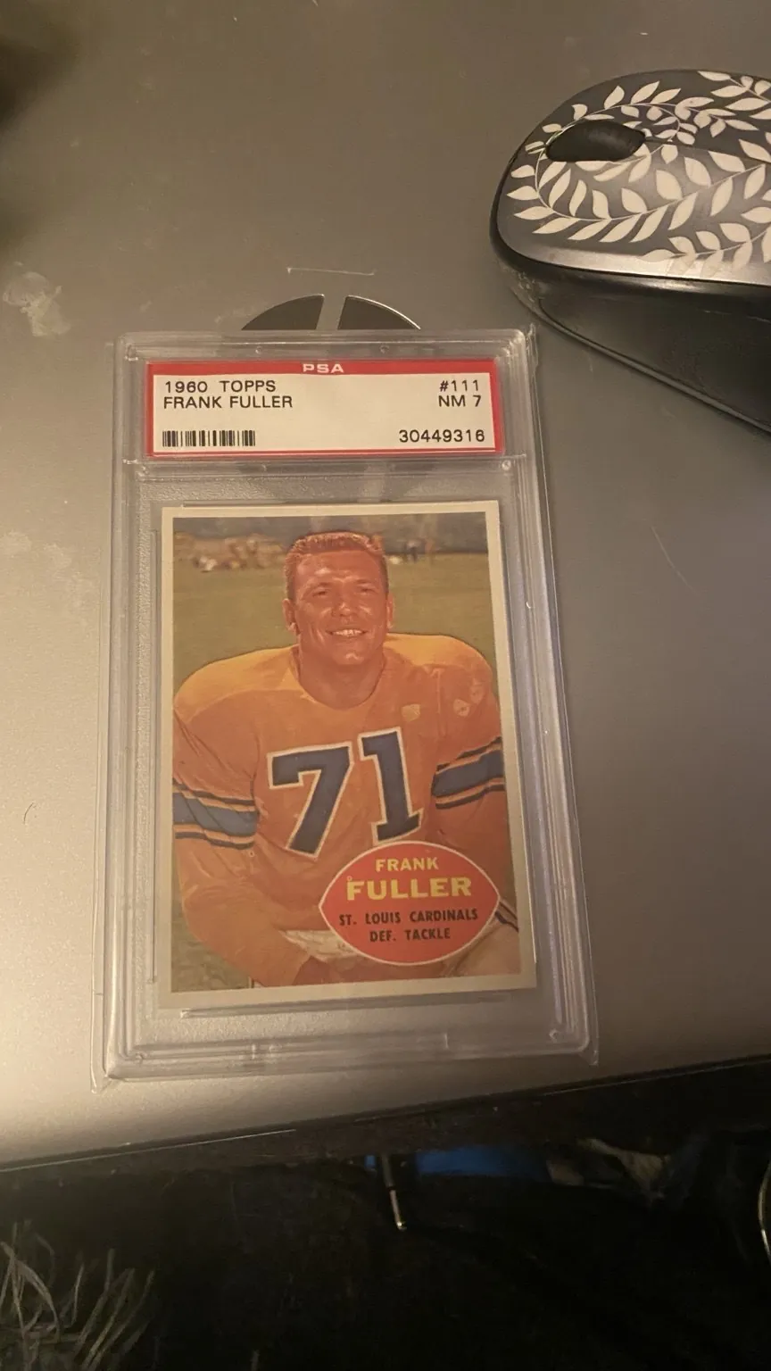 1960 Topps Frank Fuller number 111 card in a PSA holder.